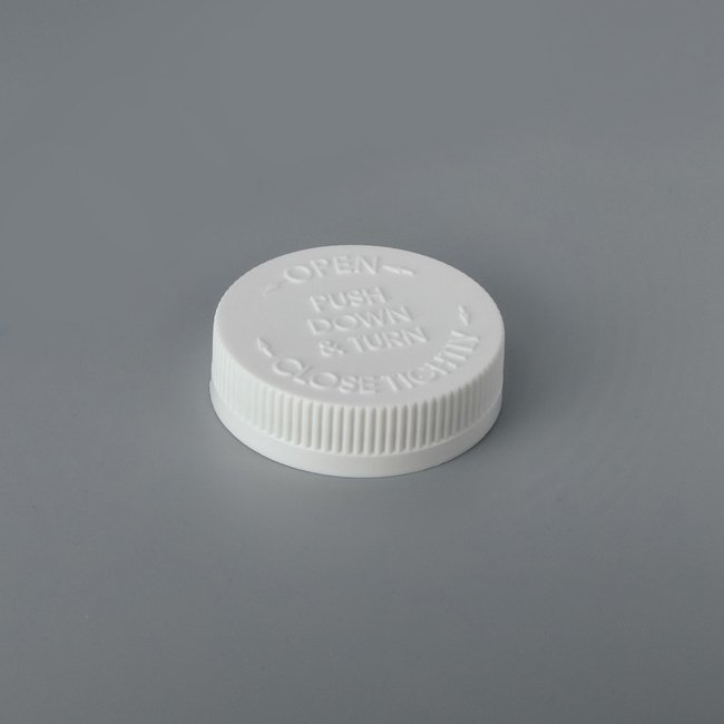 63mm Embossed Child-Resistant Push Down & Turn Closure Cap - Image 1