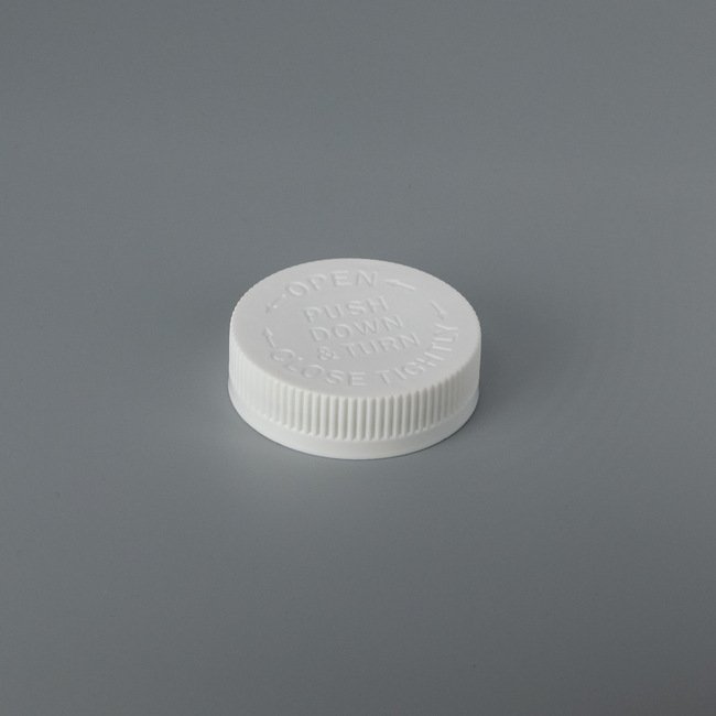 53mm Debossed Child-Resistant Push Down & Turn Cap - Image 1