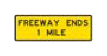 W-Series Black on Yellow Warning Sign for Freeway Use - 144x48 - Image 1