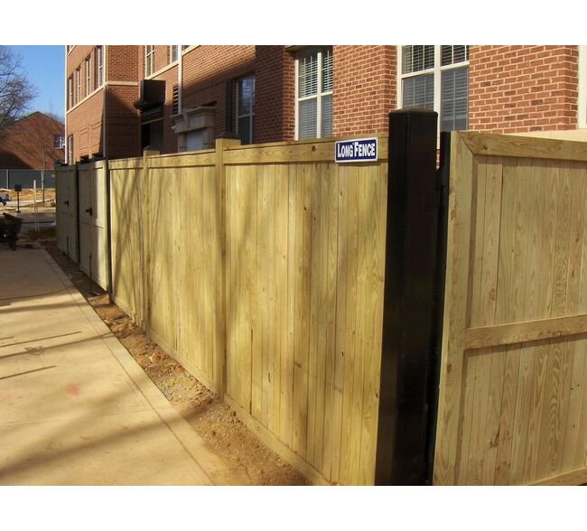 Durable Wood Vertical Board Fences - Image 1